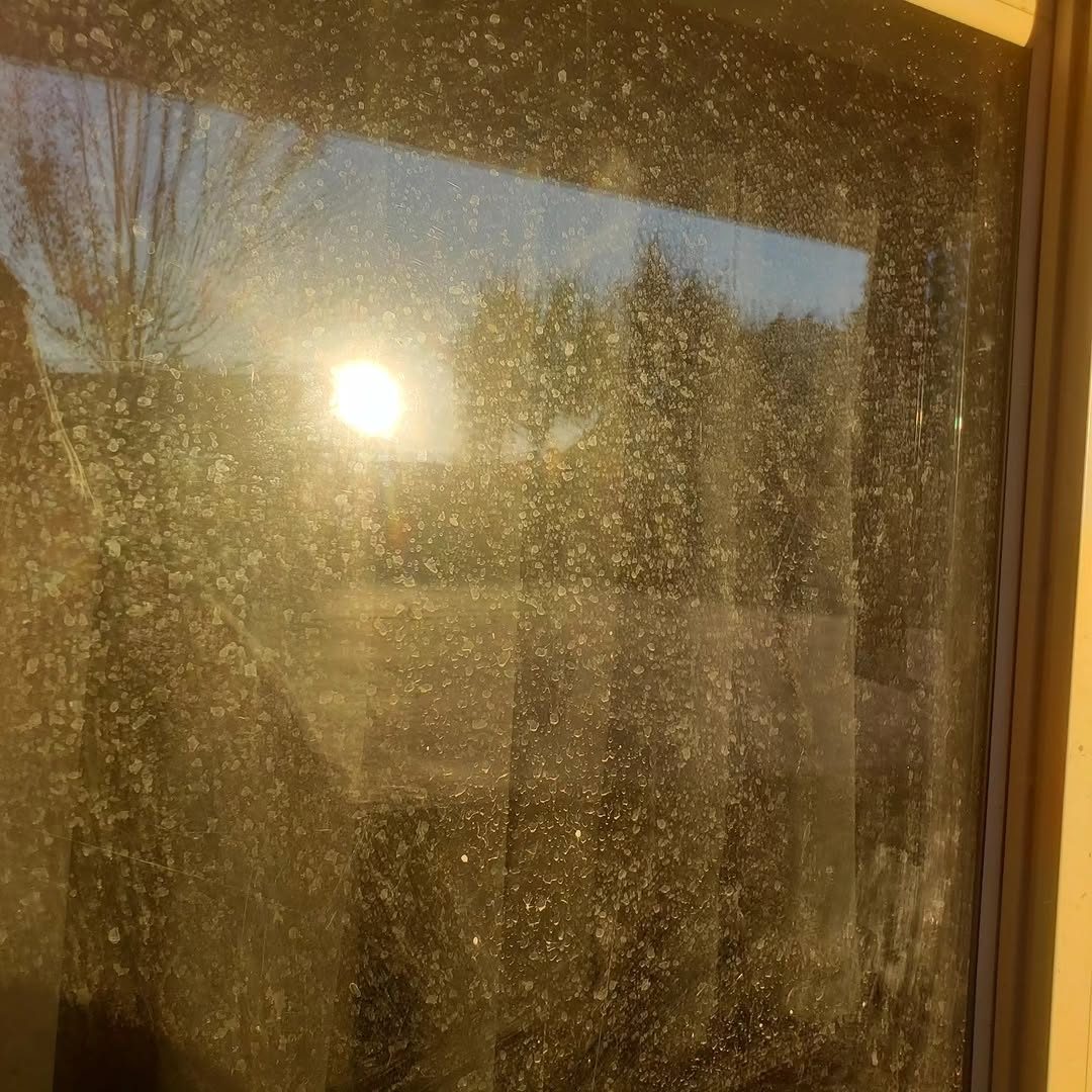 Window before, hard-water spots